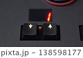 Close-Up Finger Changing Preset with Arrow Buttons on Lighting Mixer, 4K 138598177