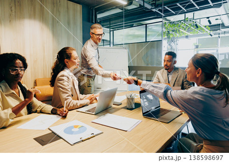 Workgroup gathers to commemorate their shared accomplishment and agreement 138598697