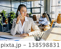 Confident Sales Representative Finalizing Important Contract While Reviewing Data And Engaging With Colleagues 138598831
