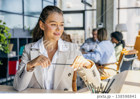 Office professional scrutinizing budget data meticulously 138598841
