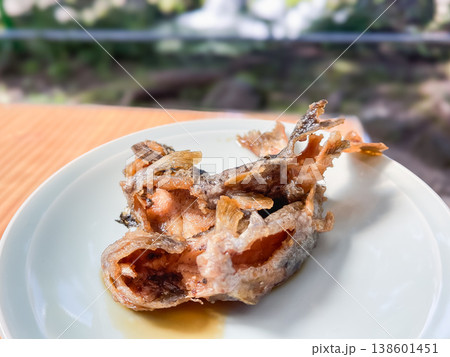 川魚料理。渓流の女王、アマゴ(ヤマメ)の南蛮漬け。天ぷらにした魚を甘酢タレに漬けた和食。 138601451