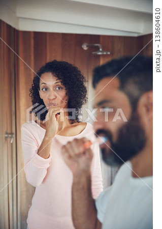 Bathroom, couple and brushing teeth together in routine, thinking and dental in morning, Man and woman, cleaning mouth and fresh by oral hygiene, self care and health or wellness in sanitary home 138604610