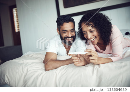 Couple, smiling and bedroom with pregnancy test, positive and bed with happiness, results and excited. Man, woman and baby with stick, love and maternity for future family, surprise and pregnancy Couple, smiling and bedroom with pregnancy test, positive and bed with happiness, results and excited. Man, woman and baby with stick, love and maternity for future family, surprise and pregnancy 138604689