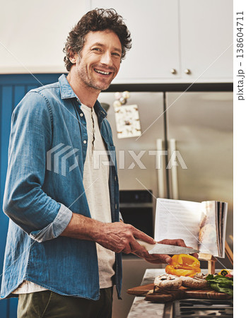 Happy, portrait and man chop vegetables in the kitchen for diet, healthy or nutrition dinner. Smile cooking and mature male person from Canada cutting ingredients for a supper or lunch meal at home. Happy, portrait and man chop vegetables in the kitchen for diet, healthy or nutrition dinner. Smile cooking and mature male person from Canada cutting ingredients for a supper or lunch meal at home. 138604711