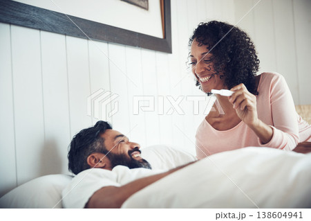 Couple, surprise and happy with pregnancy test, positive and bed with smile, results and excited. Man, woman and baby with stick, love and maternity for future family, bedroom and pregnant together Couple, surprise and happy with pregnancy test, positive and bed with smile, results and excited. Man, woman and baby with stick, love and maternity for future family, bedroom and pregnant together 138604941