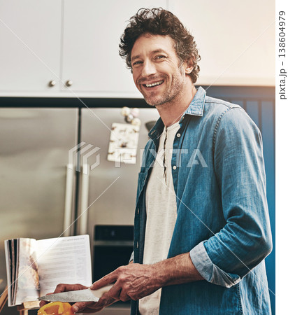 Smile, portrait and man cutting vegetables in the kitchen for diet, healthy or nutrition dinner. Happy, cooking and male person from Canada chop ingredients for a supper or lunch meal at home. 138604979