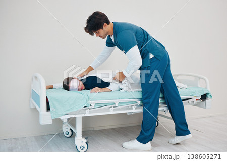 Sleeping, hospital and tired nurse on bed for rest, nap and break for burnout, exhausted and fatigue. Healthcare, blanket and health workers relax for medical service, wellness and stress in clinic Sleeping, hospital and tired nurse on bed for rest, nap and break for burnout, exhausted and fatigue. Healthcare, blanket and health workers relax for medical service, wellness and stress in clinic 138605271