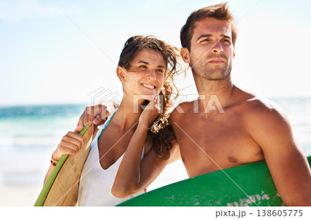 Couple, beach and surf, holiday and travel with summer and bonding outdoor, sport and people on a date. Ocean, wind and view with surfing, man and woman in relationship, fun activity and adventure Couple, beach and surf, holiday and travel with summer and bonding outdoor, sport and people on a date. Ocean, wind and view with surfing, man and woman in relationship, fun activity and adventure 138605775