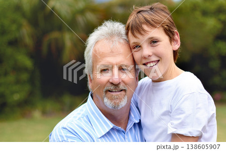 Family, portrait and man or boy with smile for bonding, love and care in backyard, park or nature. Senior, person and child together with embrace, relationship or happiness at home, apartment or joy 138605907
