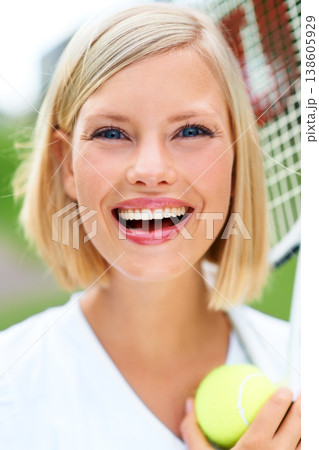 Smile, portrait or happy woman with a ball in tennis training match, fitness exercise or game outdoors. Racket, healthy start or face of girl athlete on court ready for sports, wellness or workout 138605929