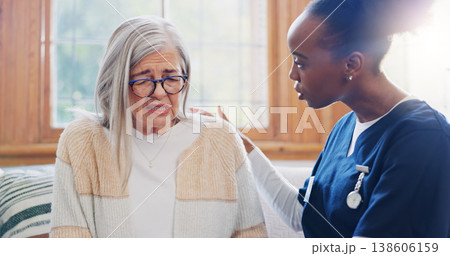 Mature, sad woman or nurse with support or results in consultation for bad news or cancer disease. Stress, depression or caregiver with a crying senior patient for empathy, sympathy or help in home Mature, sad woman or nurse with support or results in consultation for bad news or cancer disease. Stress, depression or caregiver with a crying senior patient for empathy, sympathy or help in home 138606159