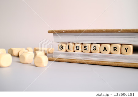 Glossary word written on a wooden block in a book Glossary word written on a wooden block in a book 138606181