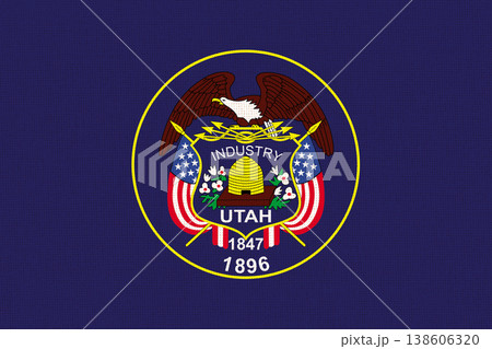 Flag of Utah state on fabric surface. Old Utah flag used from 2011 to 2024 Flag of Utah state on fabric surface. Old Utah flag used from 2011 to 2024 138606320