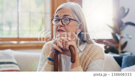 Home, thinking and senior woman with anxiety, sad and retirement with depression, mental health or dementia. Mature person, old lady or pensioner with walking stick, alzheimer and relax in a lounge Home, thinking and senior woman with anxiety, sad and retirement with depression, mental health or dementia. Mature person, old lady or pensioner with walking stick, alzheimer and relax in a lounge 138606333