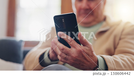 Smartphone and hands of senior man typing online on internet search in retirement home. Phone, elderly person ecommerce and scroll on health website, communication or social media 138606442