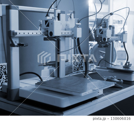 3D printer. 3D printer with blank work surface. Empty 3D printer. Modern new additive progressive technologies. 3D printing three-dimensional technology. Printing modeling manufacturing technology 3D printer. 3D printer with blank work surface. Empty 3D printer. Modern new additive progressive technologies. 3D printing three-dimensional technology. Printing modeling manufacturing technology 138606816