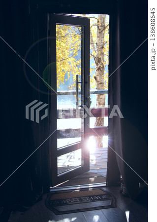 Room ventilation. View of nature from the door. Open door from room to street 138608645