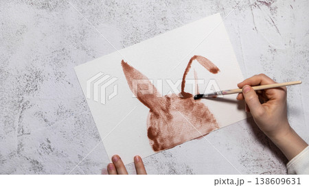 Painting Easter bunny rabbit Gift Easter idea. Do it yourself instruction postcard eco-friendly decoration. Making handmade art presents children's diy projects. Spring holiday family time Painting Easter bunny rabbit Gift Easter idea. Do it yourself instruction postcard eco-friendly decoration. Making handmade art presents children's diy projects. Spring holiday family time 138609631