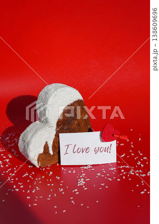 Valentine's Day proposal I LOVE YOU wishes saying caption on greeting card Delightful heartshaped pastry croissant treat, beautifully topped with colorful frosting galore. Copy space. Food 138609696