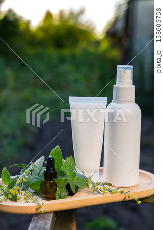 Insect repellent mosquito insecticide to kill flies bugs and mosquitoes outdoor skincare cream and spray white bottle mock up. Dermatological plant-based skin-friendly care. Sustainable skin health 138609738
