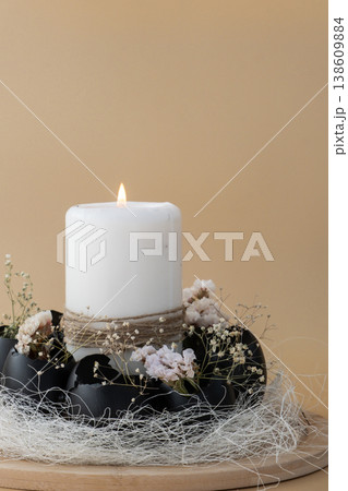 Self made egg shell with candle handmade decoration for Easter holiday. Copy space greeting card present gift ideas. Creative reuse zero waste sustainable living eco-friendly me made decor 138609884