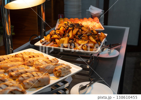 Professional catering buffet featuring grilled chicken 138610455