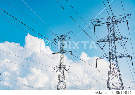 Electricity power lines and sky. Green energy. Electric voltage station. High voltage. Electricity power pylon. Electricity tower. Electrical energy. Power transmission tower 138610814