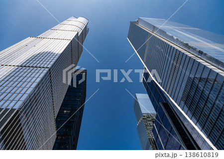 City architecture. Architecture of modern office building. Perspective city skyscraper. Modern skyscraper building. Office building in downtown. Skyscraper perspective view. Building symmetry City architecture. Architecture of modern office building. Perspective city skyscraper. Modern skyscraper building. Office building in downtown. Skyscraper perspective view. Building symmetry 138610819