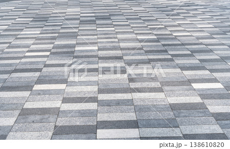 Stone tile pavement. Paving slabs or stone. Tiled sidewalk. Sidewalk made of paving slabs. Stine slabs background. Sidewalk paving background. Tiled backdrop. Background of tiled paving Stone tile pavement. Paving slabs or stone. Tiled sidewalk. Sidewalk made of paving slabs. Stine slabs background. Sidewalk paving background. Tiled backdrop. Background of tiled paving 138610820