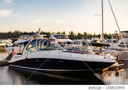 Yacht vacation in summer. Marina bay. A luxury motor yacht in sea marina bay. Yacht in boat harbor. Private luxury boat for best summer vacation. Summer boat vacation. Boat yachting. Luxury marina 138610843