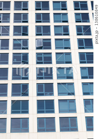 Modern facade background with window. Architecture. Building facade architecture. Building background. Window in building. Architectural detail. Background of architecture. Modern background. Modern facade background with window. Architecture. Building facade architecture. Building background. Window in building. Architectural detail. Background of architecture. Modern background. 138610849