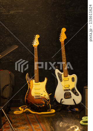 Vintage electric guitars on stage ready for a concert Vintage electric guitars on stage ready for a concert 138611624