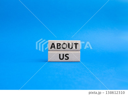 About us symbol. Concept word About us on wooden blocks. Beautiful blue background. Business and About us concept. Copy space About us symbol. Concept word About us on wooden blocks. Beautiful blue background. Business and About us concept. Copy space 138612310