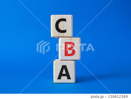 CBA - Cost Benefit Analysis symbol. Wooden cubes with word CBA. Beautiful blue background. Business and Cost Benefit Analysis concept. Copy space. CBA - Cost Benefit Analysis symbol. Wooden cubes with word CBA. Beautiful blue background. Business and Cost Benefit Analysis concept. Copy space. 138612369