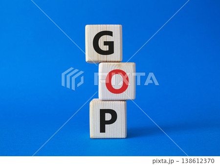 GOP - Gross Operating Profit symbol. Concept word GOP on wooden cubes. Beautiful blue background. Business and GOP concept. Copy space. GOP - Gross Operating Profit symbol. Concept word GOP on wooden cubes. Beautiful blue background. Business and GOP concept. Copy space. 138612370