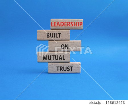 Leadership symbol. Wooden blocks with words Leadership Built on Mutual Trust. Beautiful blue background. Business and Leadership concept. Copy space 138612428