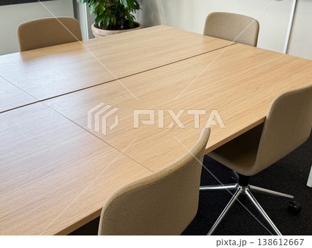 Empty conference table in modern office meeting room with copy space. Empty conference table in modern office meeting room with copy space. 138612667