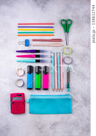 Decluttering concept. Stationery organization on work desk Decluttering concept. Stationery organization on work desk 138612744