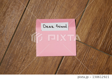 copy space message pattern envelope white paper label that reads dear friend hand writing copy space message pattern envelope white paper label that reads dear friend hand writing 138612921