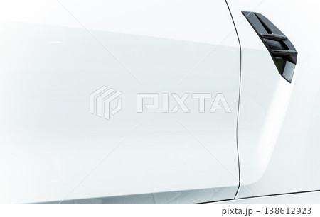 Closeup white smooth metallic car frame door handle isolated on white background Closeup white smooth metallic car frame door handle isolated on white background 138612923