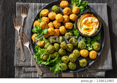 Middle eastern falafel with hummus on a plate 138612965