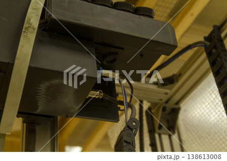 The device in the image is a vertical wall printer, a specialized inkjet printer designed to print directly onto vertical surfaces like walls 138613008