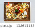Cheese board featuring blue cheese, brie, and hard cheeses 138613132