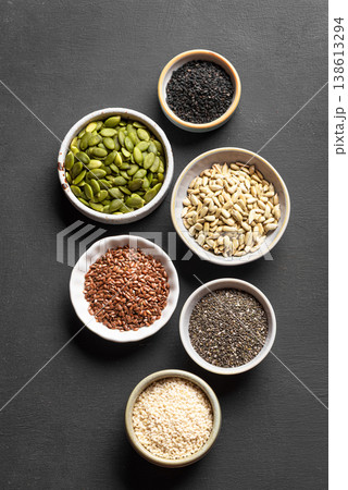 Assortment of seeds in bowls for healthy eating Assortment of seeds in bowls for healthy eating 138613294