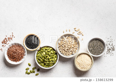 Assortment of seeds in bowls for healthy eating Assortment of seeds in bowls for healthy eating 138613299