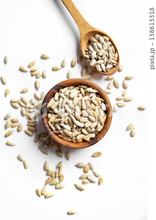 Sunflower seeds in bowl isolated 138613318
