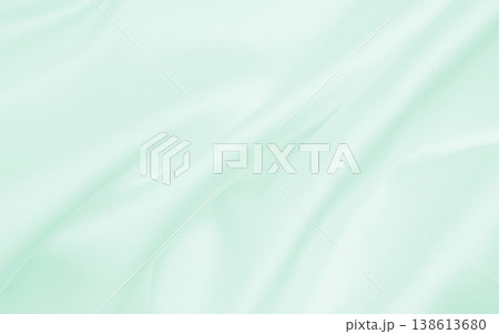Smooth elegant green silk or satin luxury cloth texture as abstract background. Luxurious background design 138613680