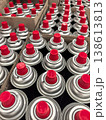 Spray paint cans stacked in rows at a vibrant art supply store 138613813