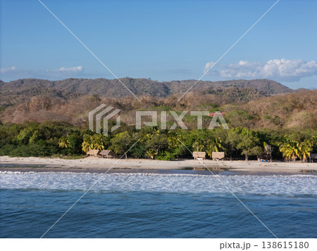Coastal view with beach huts and trees in Nicaragua during daytime Coastal view with beach huts and trees in Nicaragua during daytime 138615180