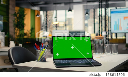 Chroma key display on a modern laptop in empty company workspace, HR department office space prepared for hiring process, interviews and career development plans. PC with mockup. Chroma key display on a modern laptop in empty company workspace, HR department office space prepared for hiring process, interviews and career development plans. PC with mockup. 138615806
